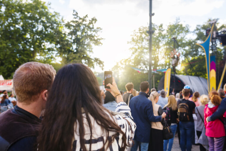 Couple taking selfie during festival